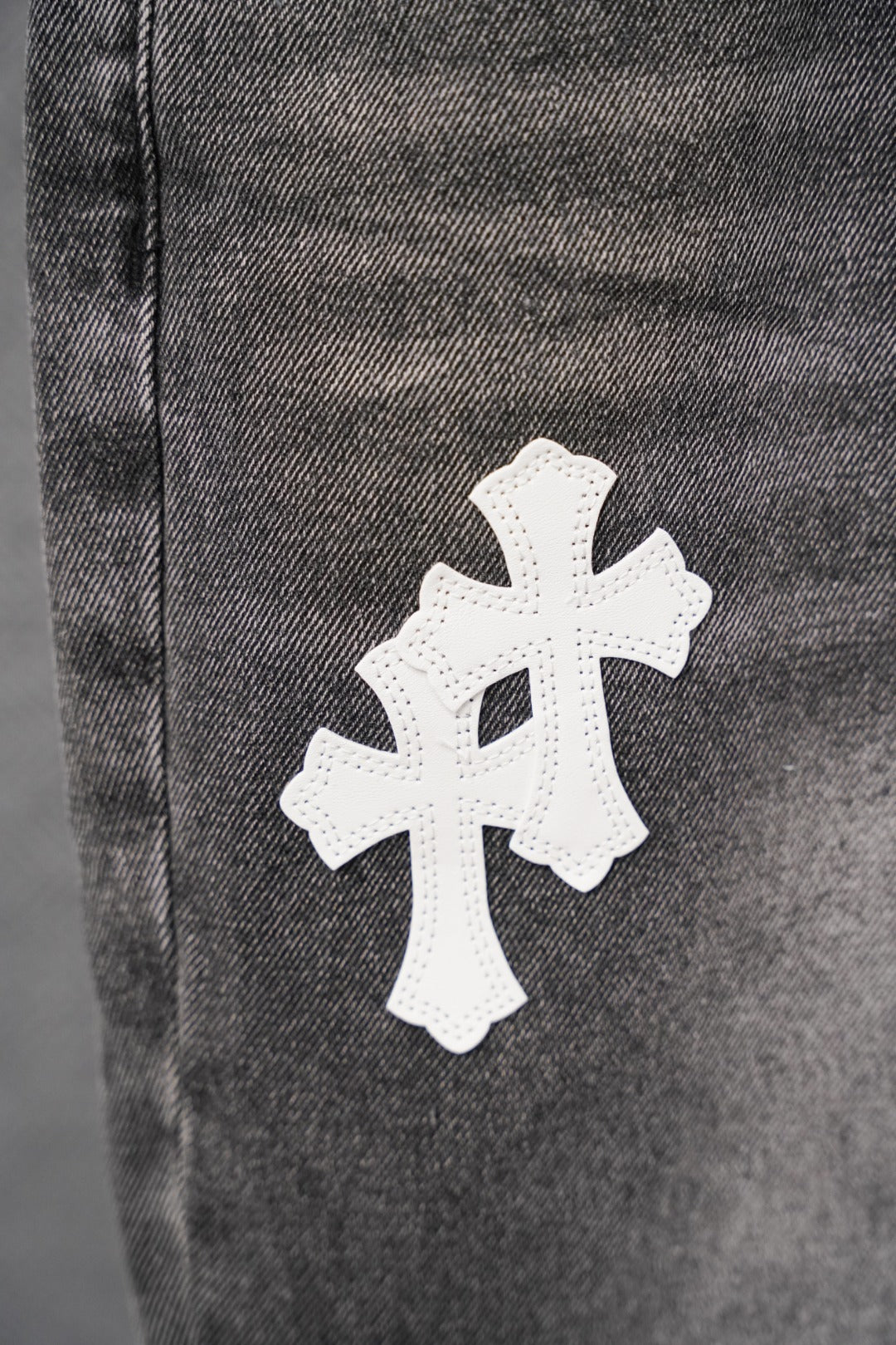 Dark gray denim with large white cross patch detail
