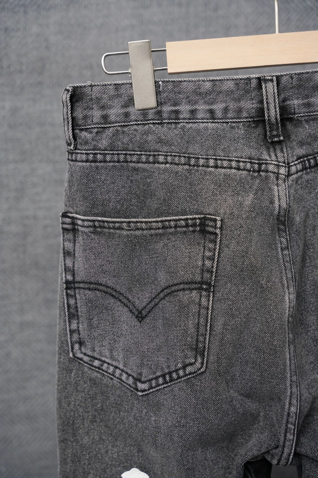 Black denim jeans back pocket with stitched heart yoke detail
