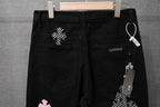 Black Chrome pants with belt loops, front pockets, and checkered keychain charm