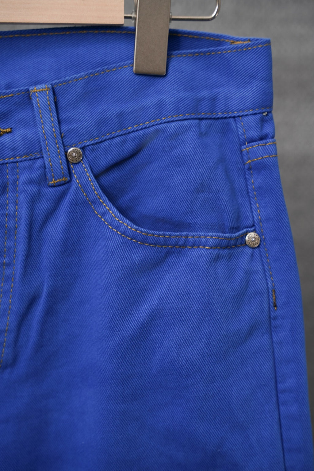 Blue Chrome pants front pocket area with coin pocket and metal button
