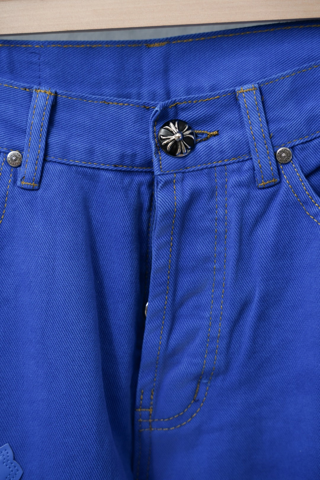 Blue Chrome pants waistband with button closure, belt loops, and stitched fly
