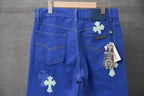Blue pants with cross-shaped patches at front, zip fly and belt loops