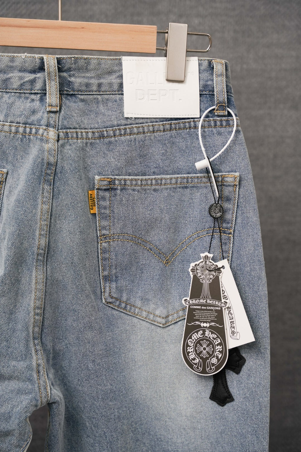 Light-wash denim pants with front patch pocket and stitched details; with hangtag