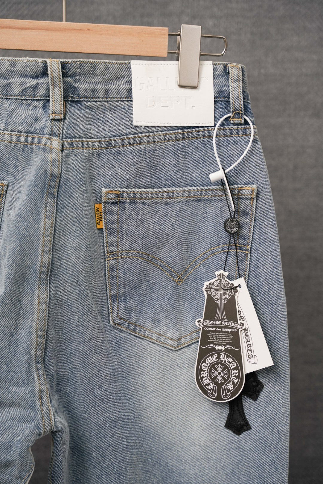 Light-wash denim pants with front patch pocket and stitched details; with hangtag