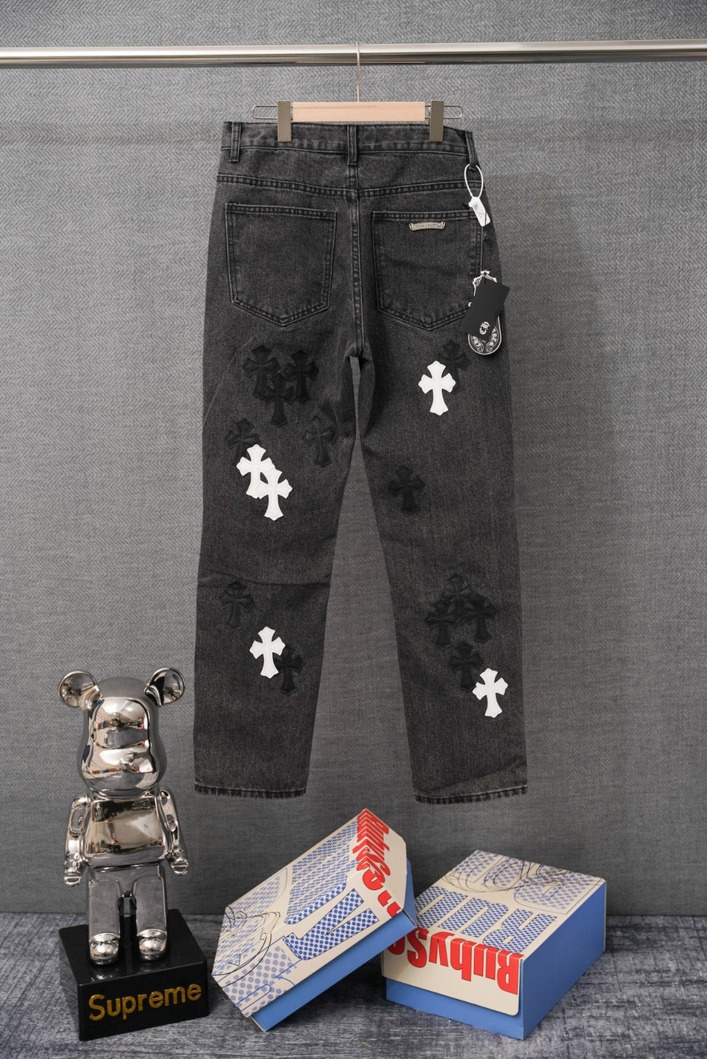 Chrome pants, dark denim with white cross patches and back-pocket cross detail