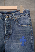Chrome denim pants with star-shaped button and blue cross patch