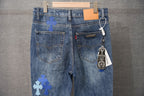 Denim pants with blue cross patches, front pockets and fly, hanging tag