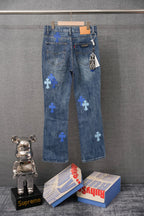 Chrome denim pants with blue cross patches and back pockets