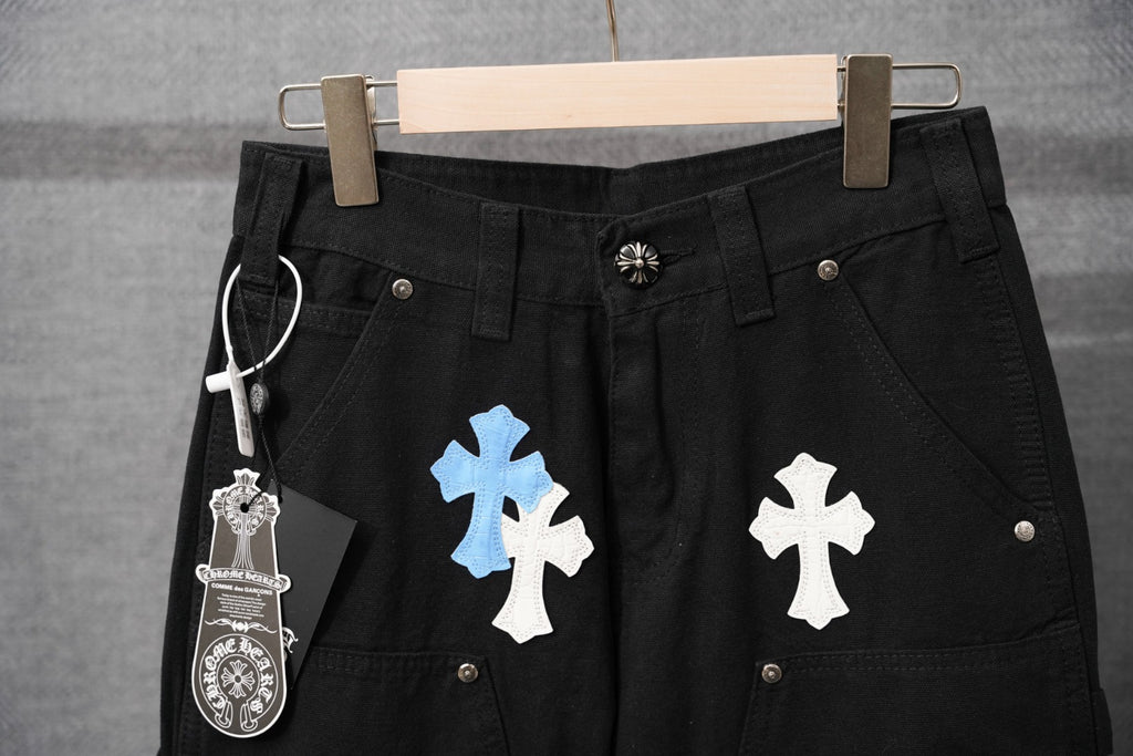 Black Chrome pants with cross patches and small front button details