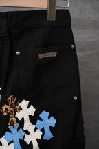 Black denim-look pants with button fly and embroidered oval chest logo patch