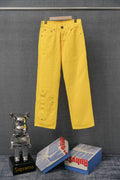 Yellow pants with front button fly and belt loops
