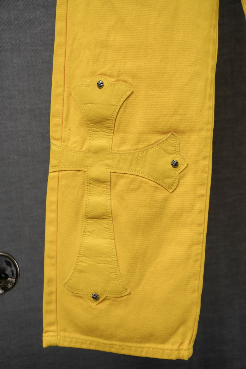 Chrome pants in bright yellow with back patch pockets and stitched seam detailing.