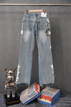 Light blue denim pants with white cross patches, front view