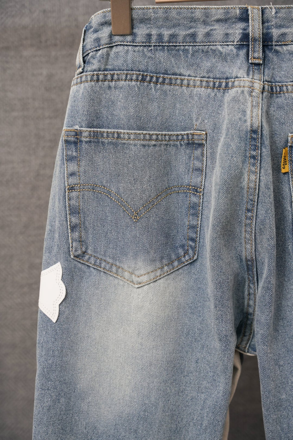 Light-wash denim pants with back yoke and rectangular back pocket