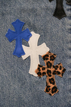 Blue denim pants with cross appliques in black, white, red, and leopard print