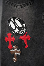 Chrome pants, dark denim with cross patches and black circular emblem