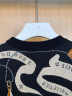 Louis Vuitton knit collar and shoulder with large white abstract shapes on navy