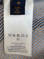 Louis Vuitton care label with size M, Made in Italy, and washing instructions