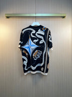 Louis Vuitton short-sleeve knit top with multicolor abstract print on dark navy background