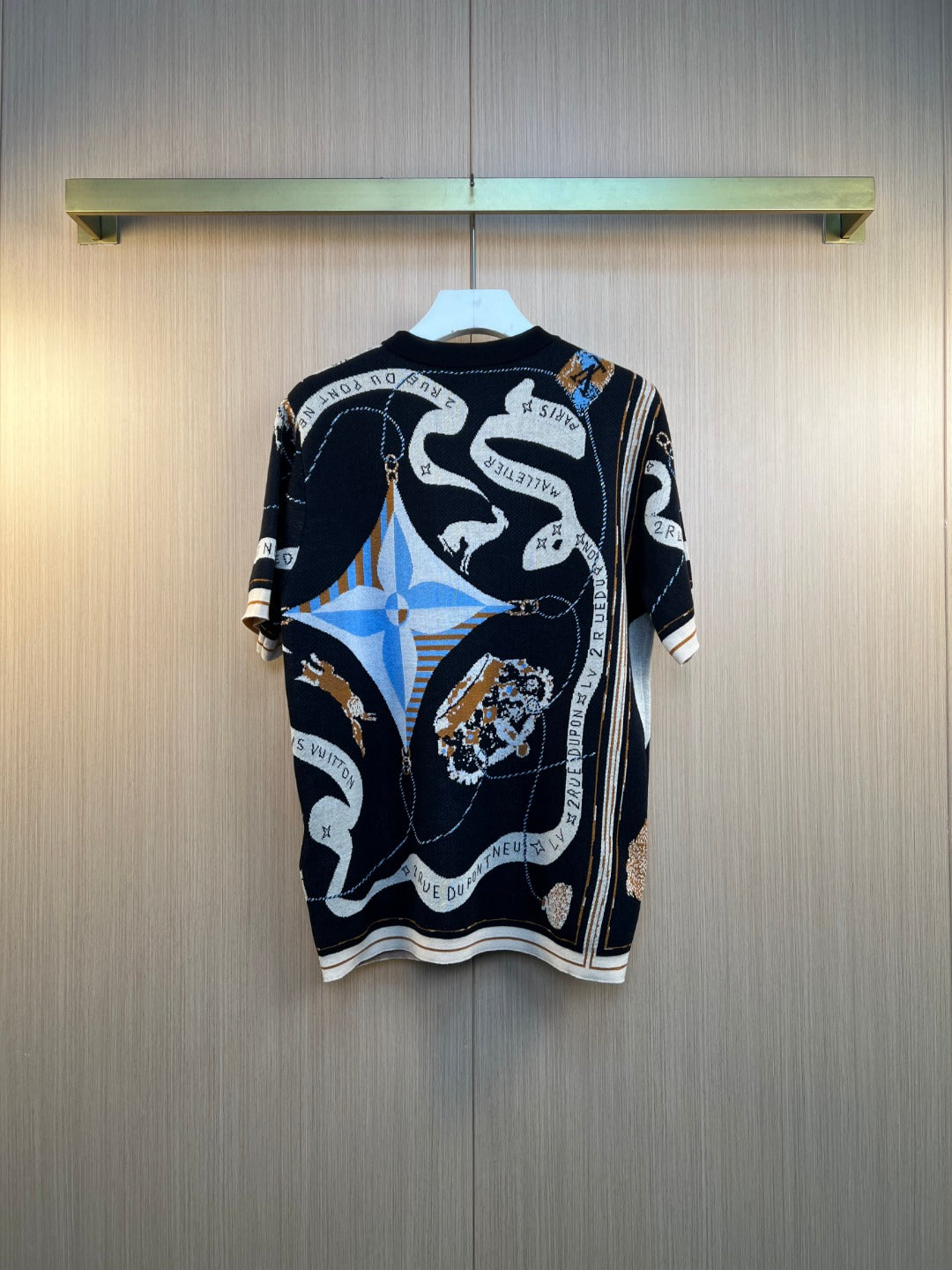Louis Vuitton short-sleeve knit top with multicolor abstract print on dark navy background