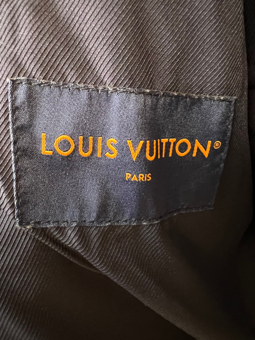 Louis Vuitton Paris fabric label inside the denim jacket