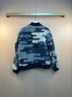 Louis Vuitton patchwork denim jacket on hanger with zip front and frayed edges