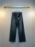 Dark gray wide-leg pants with belt loops, button-zip front, and patch pockets