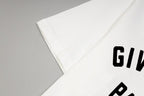 White T-shirt sleeve with partial Givenchy Paris logo print
