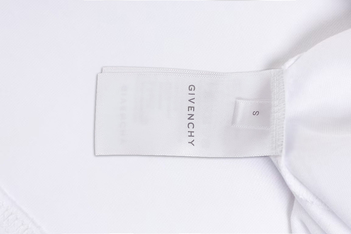 White T-shirt neckline with size label and Givenchy branding tag