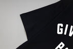 Givenchy Paris logo T-shirt detail, white lettering on black fabric