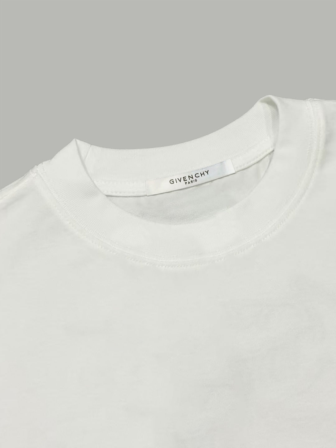 White crew-neck T-shirt with branded neckline label