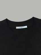 Black crew-neck T-shirt with ribbed collar and GIVENCHY neck label