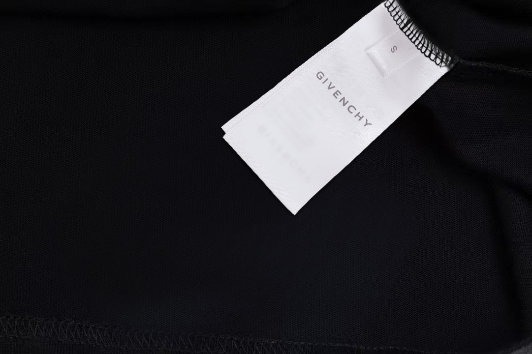 Black T-shirt care label inside neckline