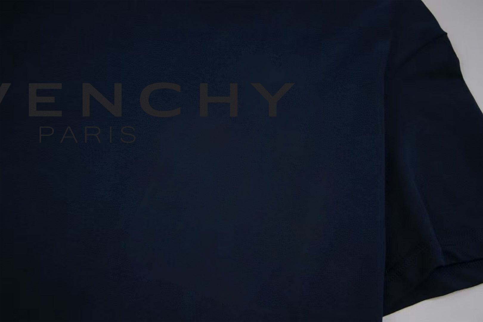 Navy Givenchy T-shirt sleeve with partial logo