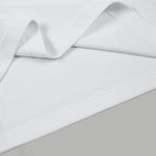 White Versace polo shirt fabric texture and side seam