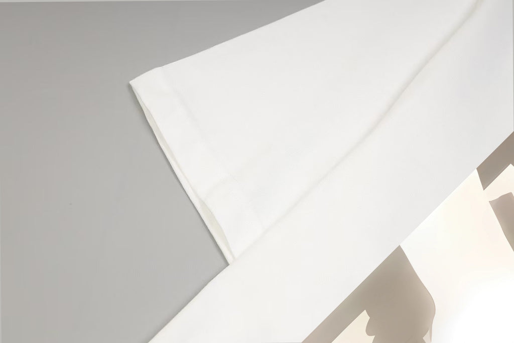 White Givenchy T-shirt sleeve and side fabric fold