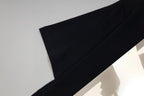 Givenchy black T-shirt sleeve and printed graphic close-up