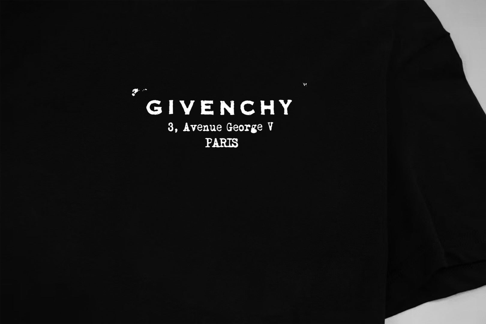 Black T-shirt back print with Givenchy address text