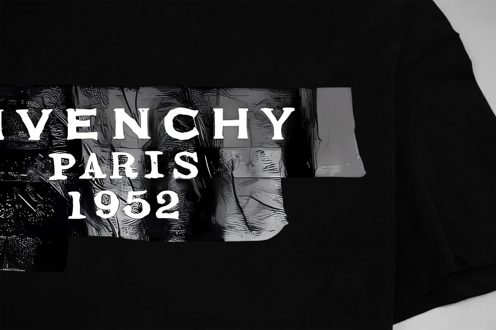 Black T-shirt close-up of PARIS 1952 logo graphic on chest