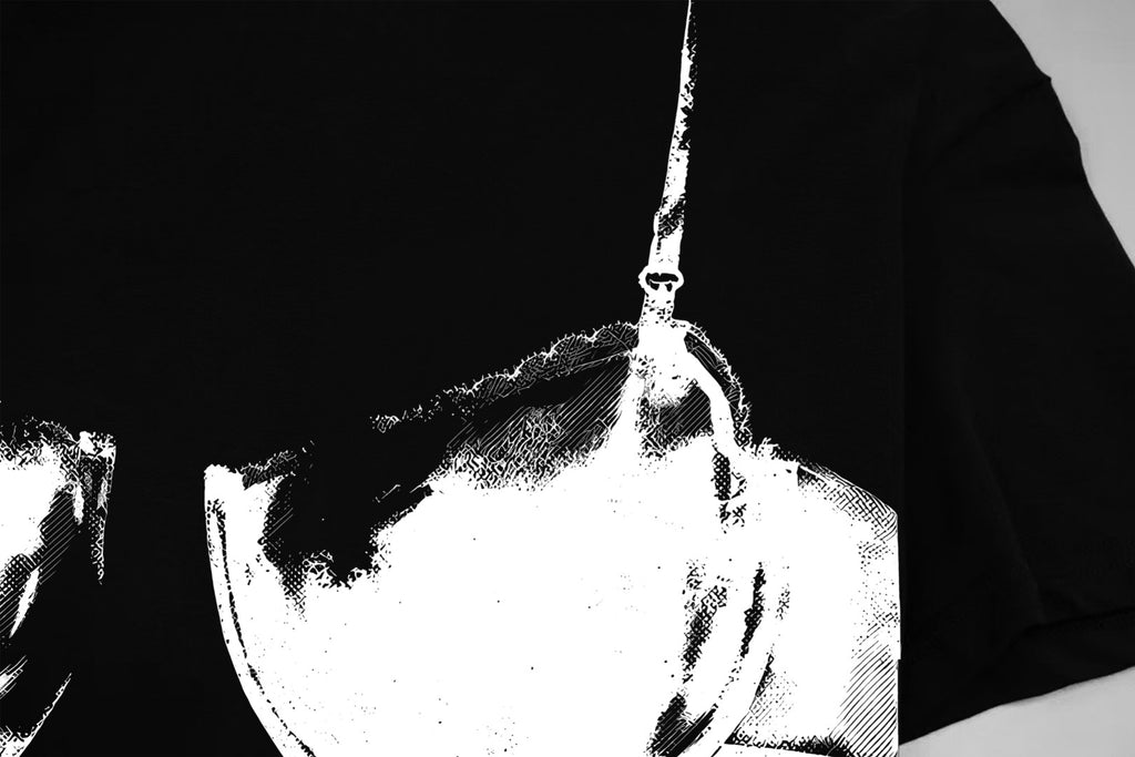 Black T-shirt close-up of white bust graphic