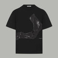 Black Givenchy T-shirt with large silver-toned portrait graphic on the front