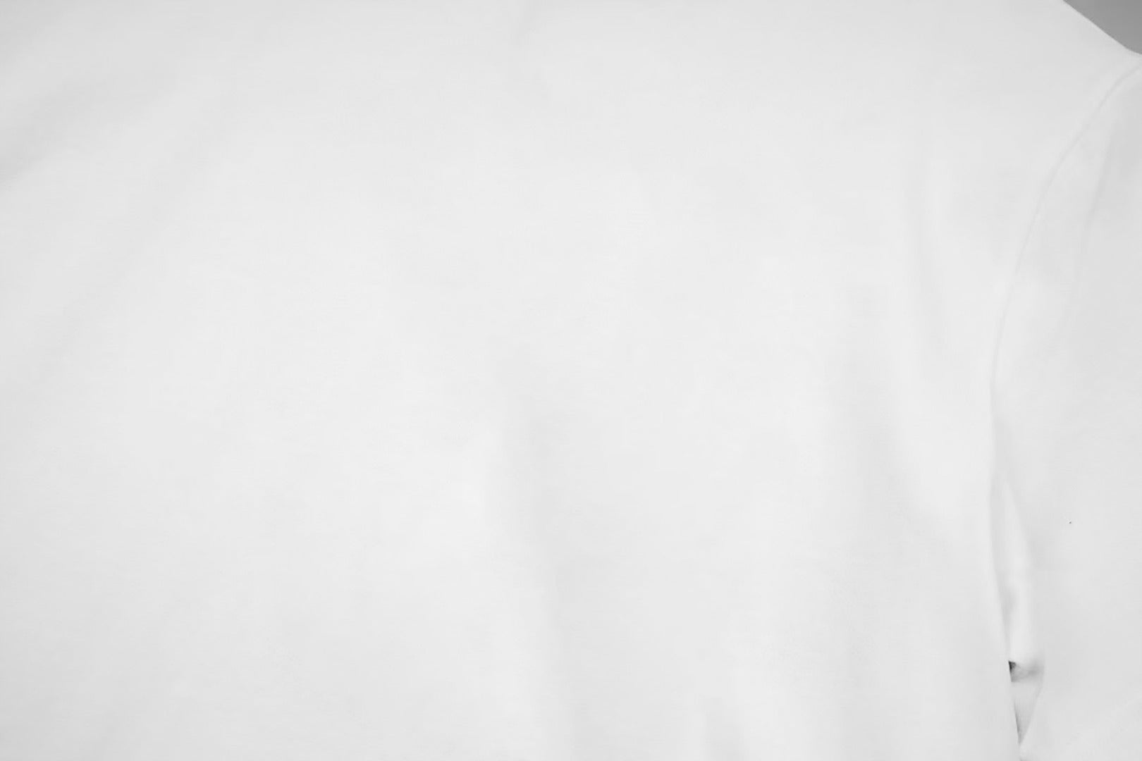 White T-shirt fabric and shoulder area close-up