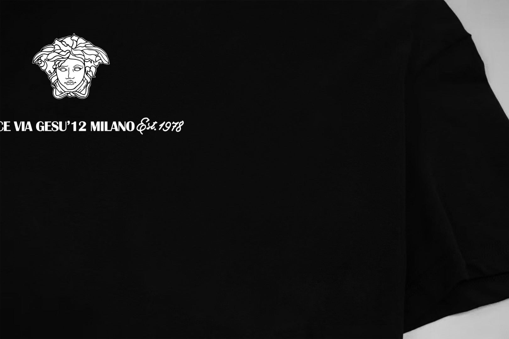 Black T-shirt with Versace baroque logo and text print
