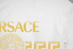 White T-shirt chest print with partial gold VERSACE text and logo.