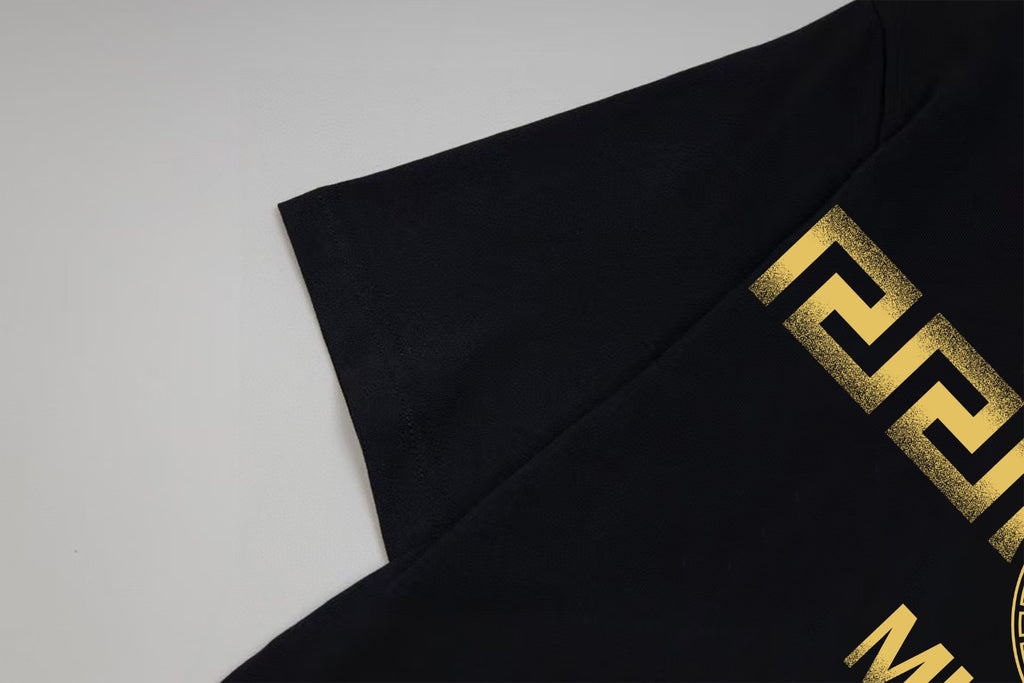 Black Versace T-shirt shoulder with partial gold logo graphic