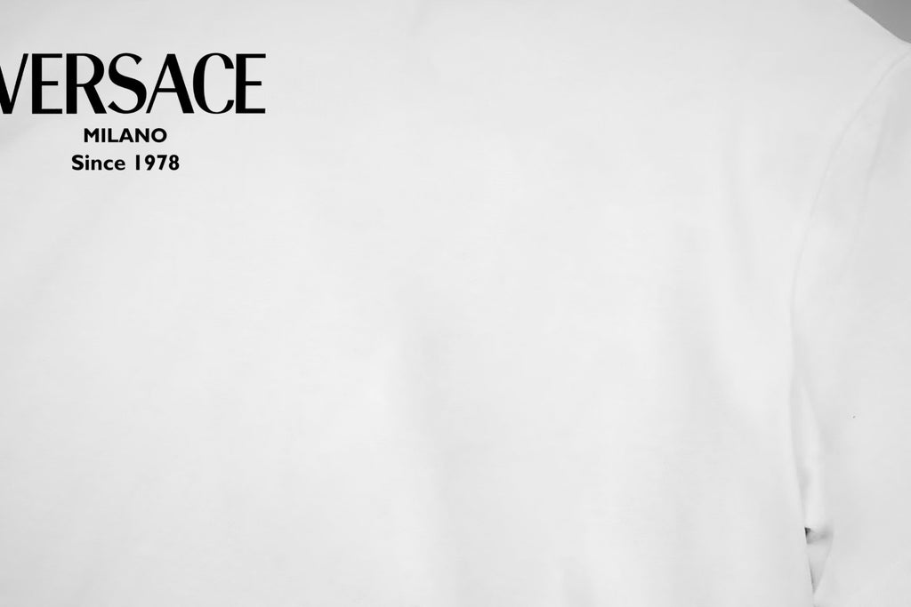 White Versace crewneck T-shirt close-up of VERSACE Milano Since 1978 logo