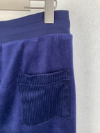 Dark blue sweatpants pocket with ribbed waist seam detail