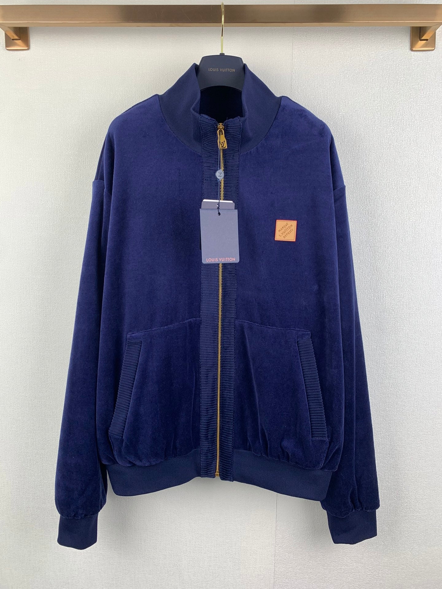 Blue Louis Vuitton zip-up jacket with stand collar and front pockets