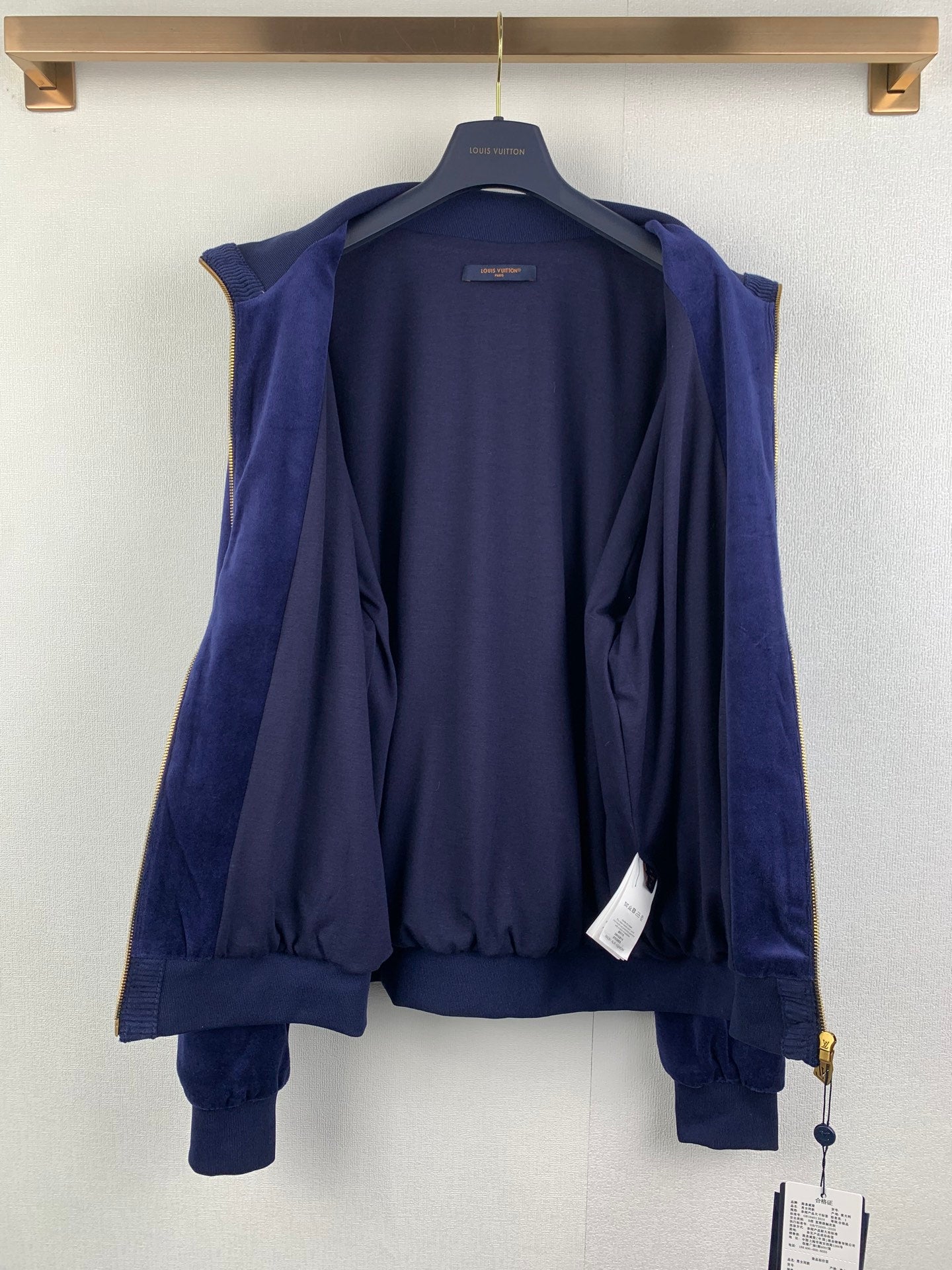 Louis Vuitton long clothes dark blue hoodie with hood open and interior back view