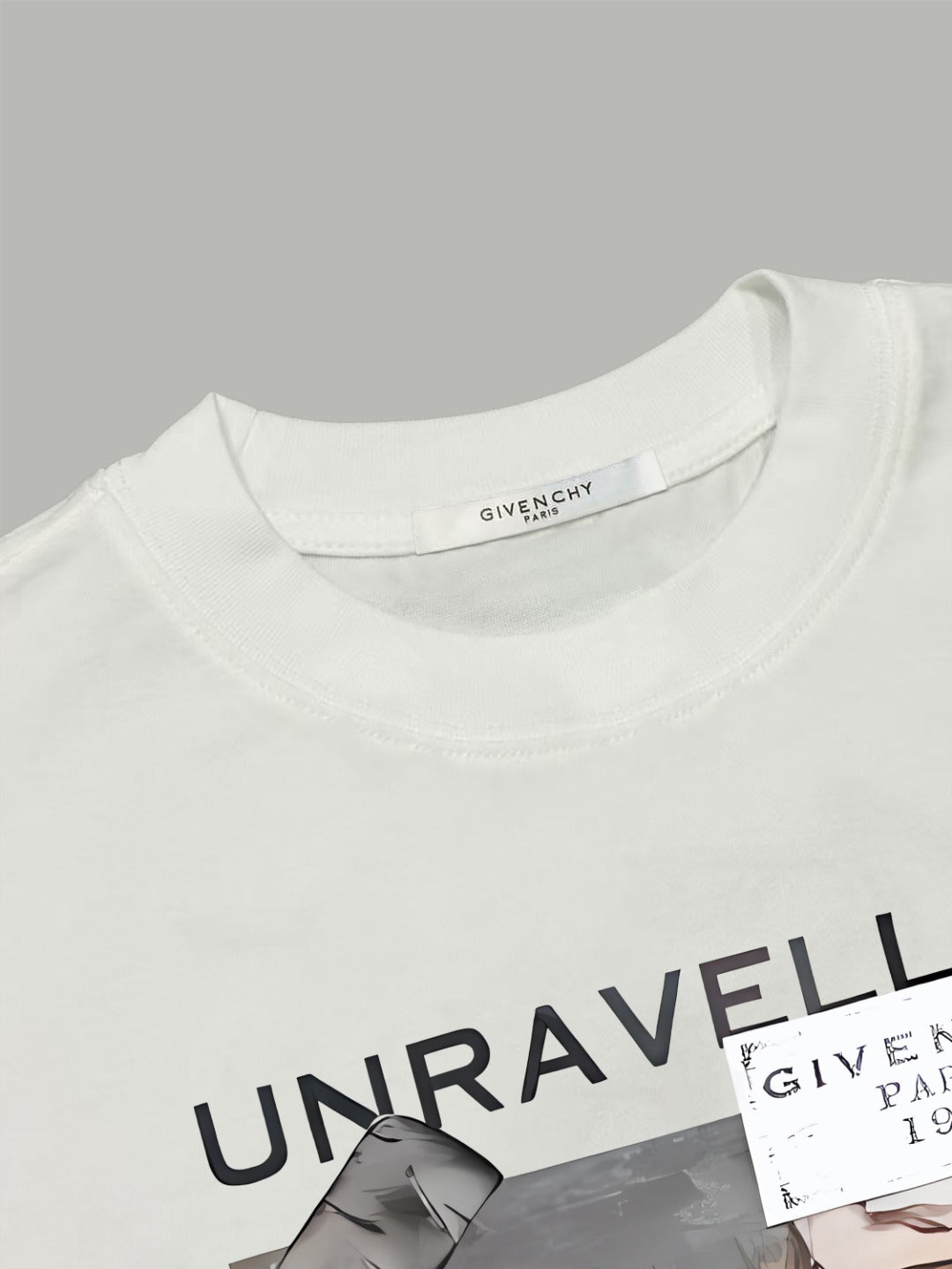 White crew-neck T-shirt with partial front graphic lettering